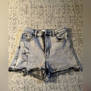 Distressed stone wash high-waisted shorts